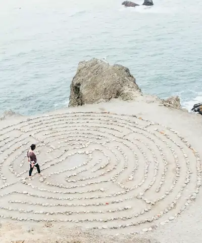 a person walking in a labyrinth,Klippe am Meer, mit Labyrinth, Reiki